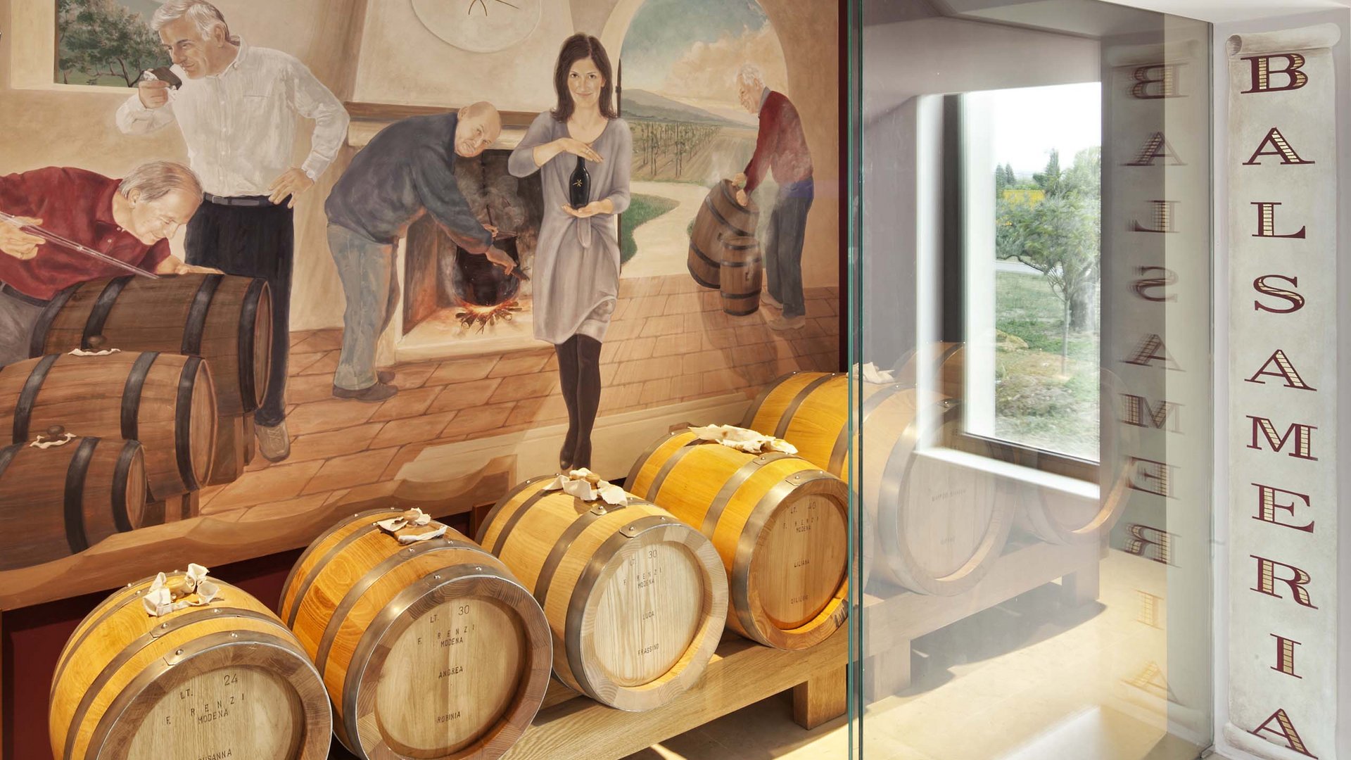 A hotel near Assisi with half board – fantastic! Wooden barrels for balsamic vinegar in cellar with mural